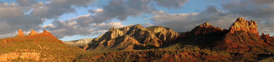 Panoramic shot of rocky mountains against cloudy sky at red rock state park