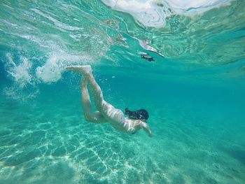 Man swimming in sea