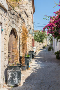Street amidst buildings against sky
