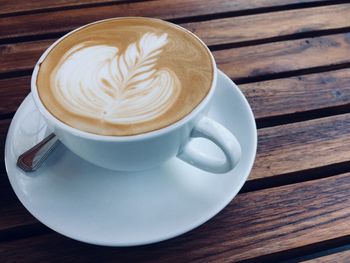 Close-up of cappuccino on table