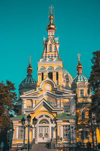 Low angle view of building against blue sky