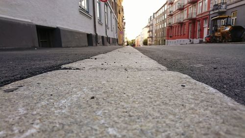 Surface level of road along buildings