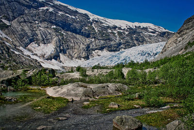 Scenic view of rocky mountains against sky