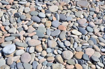 Full frame shot of pebbles on beach