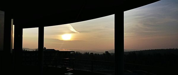 Sun shining through clouds