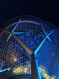 Low angle view of illuminated ferris wheel