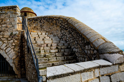 Low angle view of old building against sky