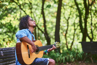 Woman playing guitar