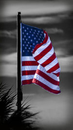 Close-up of flag against sky