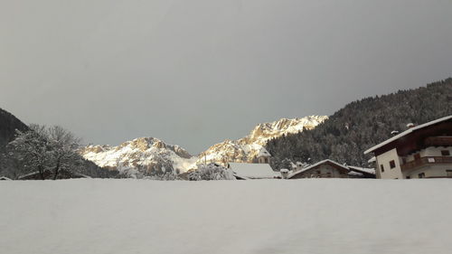 Snowcapped mountains against clear sky