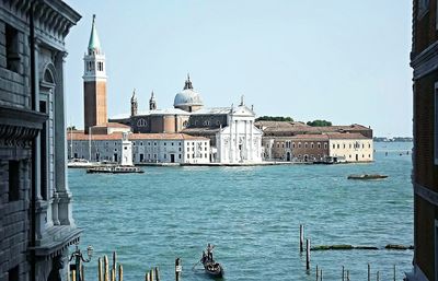 View of cathedral in city against clear sky