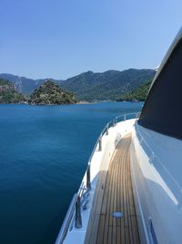 Panoramic view of sea against clear blue sky