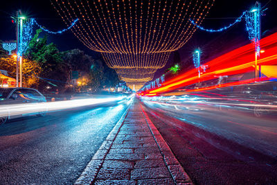 Light trails on road at night