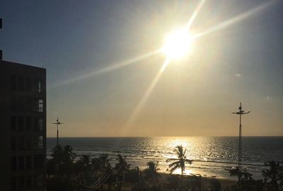 Scenic view of sea against sky on sunny day