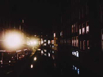 View of illuminated street at night