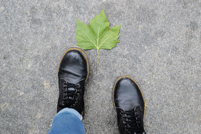 Low section of person standing on ground