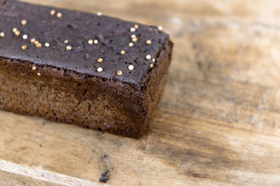 Close-up of a freshly baked loaf of rye bread. this is a wheat free rye bread made in a 