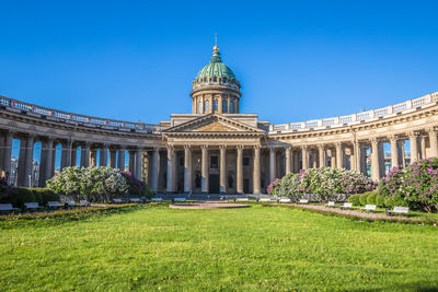 Facade of historic building against blue sky