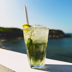 Close-up of mojito cocktail on table