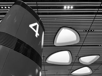 Low angle view of illuminated ceiling at railroad station