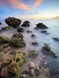 Scenic view of sea against sky during sunset