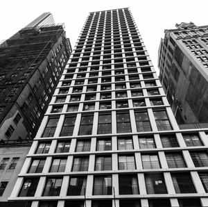 Low angle view of modern buildings against clear sky