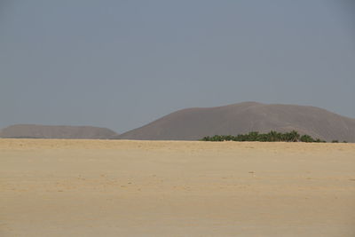 Scenic view of desert against sky