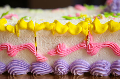 Close-up of multi colored candies on table