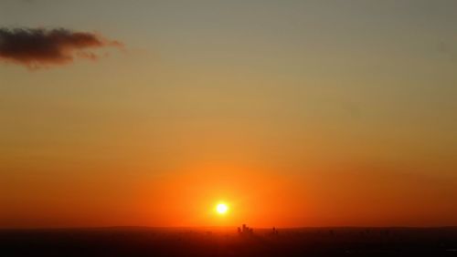 Scenic view of silhouette landscape against sky during sunset