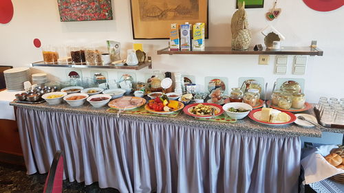 Various fruits in plate on table