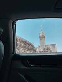 Buildings seen through car window