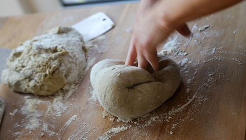 Woman baking bread at home