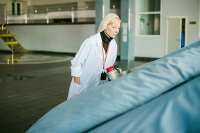 Close-up of female doctor working at hospital