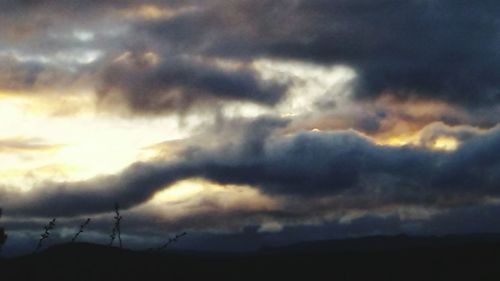 Scenic view of dramatic sky during sunset