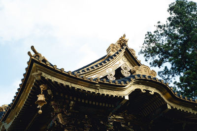 Low angle view of temple building against sky