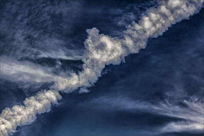 Low angle view of vapor trail in sky