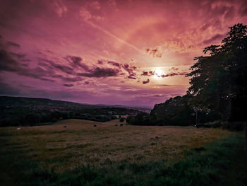 Scenic view of landscape against sky during sunset