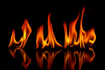 Close-up of fire against black background