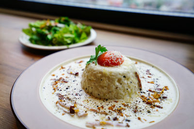 Close-up of food in plate on table