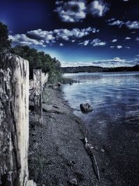 Scenic view of landscape against cloudy sky