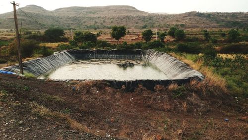 Scenic view of dam against sky