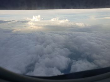 Aerial view of cloudscape from airplane window