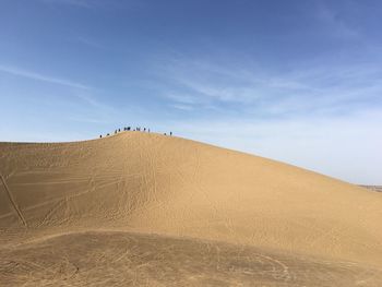 Scenic view of desert against sky