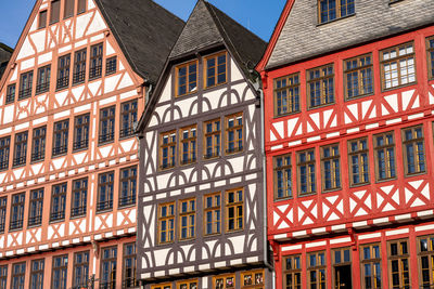 Facade of some half-timbered houses on romerburg square, frankfurt, germany