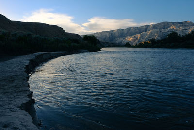 Scenic view of river against sky