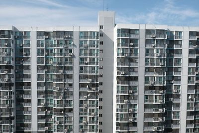 Modern cityscape against sky