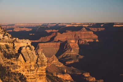 Aerial view of rock formations against sky