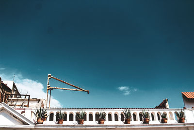 Low angle view of construction site against sky