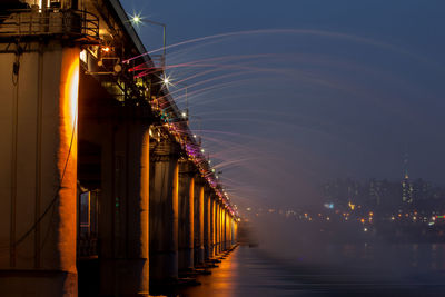 Banpo bridge over han river against sky in city at night