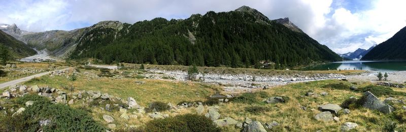 Panoramic view of lake and mountains against sky